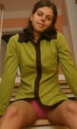 Girl wearing Shirt and panties.