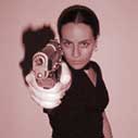 Woman pointing a gun